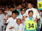 direktur-utama-bank-bri-suprajarto-bersama-anak-anak-yatim.jpg