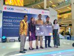 direktur-utama-garuda-indonesia-irfan-setiaputra-residen-direktur-uob-indonesia-hendra-gunawan.jpg
