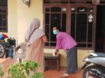 distribusi-bantuan-makanan-siap-saji-warga-isoman_20210715_153731.jpg