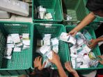 distribusi-paket-obat-gratis-untuk-pasien-covid-19-isolasi-mandi_20210719_212806.jpg