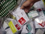distribusi-paket-obat-gratis-untuk-pasien-covid-19-isolasi-mandi_20210719_213556.jpg