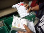 distribusi-paket-obat-gratis-untuk-pasien-covid-19-isolasi-mandi_20210719_213823.jpg