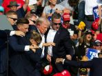 donald-trump-ditembak-saat-kampanye-pilpres-as-2024_20240714_222814.jpg