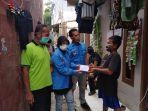 dpp-komite-nasional-pemuda-indonesia-knpi-memberikan-bantu.jpg