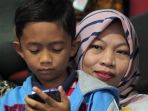 dpr-sahkan-amnesti-untuk-baiq-nuril_20190725_222333.jpg