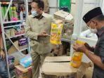 dprd-pringsewu-menyidak-gudang-ritel.jpg