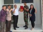 dr-minadi-pujaya-tengah-saat-penyerahan-kunci.jpg
