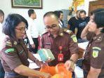 dua-bule-tersangka-kasus-perampokan-money-changer.jpg