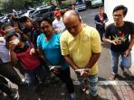 dua-pelaku-pembacokan-tiba-di-mapolda-metro-jaya_20170712_173403.jpg