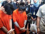 dua-pelaku-pembunuh-iin-y-24-dan-r-17-tiba-dari-jambi.jpg
