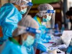 dunia-menghadapi-virus-omicron-varian-sars-cov-2-di-tahun-2022_20220107_161440.jpg
