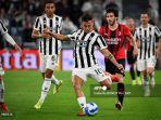 dybala-menendang-bola.jpg