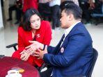 eka-widiastuti-saat-berbincang-dengan-kabid-organisasi-koni-dki-jakarta-muhammad-ied.jpg