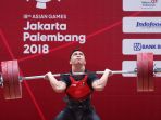 eko-yuli-irawan-sumbang-emas-untuk-indonesia_20180821_183934.jpg