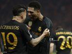 ekpresi-pemain-real-madrid-dani-ceballos-dan-jude-belingham-usai-cetak-gol.jpg