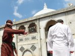 eksekusi-hukuman-cambuk-pelanggaran-hukum-jinayah-aceh_20160302_104340.jpg