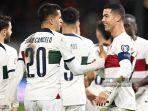 ekspresi-pemain-timnas-portugal-cristiano-ronaldo-dan-joao-cancelo-di-kualifikasi-euro-2024.jpg