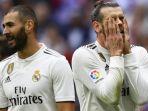 ekspresi-sedih-penyerang-real-madrid-gareth-bale-kanan-dan-karim-benzema_20181021_074338.jpg