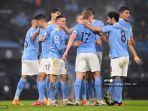 elandang-inggris-manchester-city-phil-foden-merayakan-bersama-rekan-satu-timnya.jpg