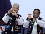 enampilan-ganjar-mahfud-kenakan-jaket-varsiti-di-debat-terakhir-pilp.jpg