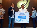 erick-thohir-terima-bantuan-dari-program-brilian-fight-covid-19_20200516_214634.jpg