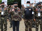 erick-thohir-terima-baret-anggota-kehormatan-gp-ansor_20211128_205350.jpg