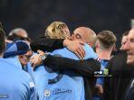 erling-haaland-dan-pep-guardiola-berpelukan.jpg
