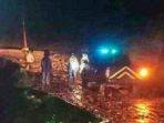 etugas-kepolisian-berjaga-jaga-di-sekitar-jembatan-kembar-parapat-mingg.jpg