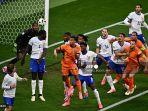 euro-2024-timnas-prancis-timnas-belanda-nathan-ake-dayot-upamecano.jpg
