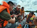 evakuasi-korban-tabrakan-speedboat-paspampres-di-palangkaraya_20200310_025124.jpg