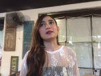 evelyn-kremes-saat-ditemui-dalam-acara-press-conferen.jpg