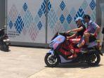 fabio-di-giannantonio-membonceng-alex-marquez.jpg