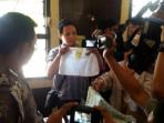 fadly-orangtua-bayi-fadhlan-yang-meninggal-dalam-inkubator_20141126_144925.jpg