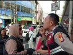 fakta-fakta-mahasiswi-gigit-polisi-di-jakarta-timur.jpg