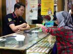 fluktuasi-harga-emas-jelang-akhir-tahun-di-malang_20221212_135016.jpg