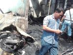 foto-bangkai-motor-yang-sudah-hangus-terbakar-di-depan-bengkel-jl_20171031_120819.jpg
