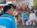 foto-gibran-mengenakan-baju-seragam-petugas-parkir1.jpg
