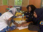 foto-penyaluran-bantuan-pendidikan-kemenag-dan-kemendikbudristek.jpg