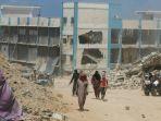 foto-tak-bertanggal-menunjukkan-sekolah-di-gaza-yang-rusak-akibat-serangan-udara-israel.jpg