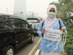front-rakyat-riau-desak-pemerintah-tuntaskan-permasalahan-kabut-asap-02_20150919_142325.jpg