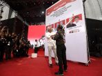 ganjar-mahfud-hadiri-hajatan-rakyat-banyuwangi_20240208_180201.jpg