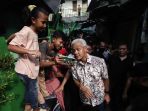 ganjar-pranowo-blusukan-ke-pademangan_20230625_221339.jpg