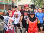 ganjar-pranowo-lari-pagi-bersama-istri-menyapa-warga-bogor.jpg