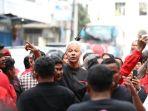 ganjar-pranowo-sempat-dihadang-oleh-ratusan-berbaju-merah.jpg