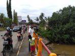 geger-kemunculan-buaya-di-padang-pariaman-bksda-diminta-warga-berhati-hati.jpg