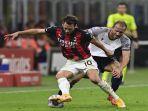 gelandang-ac-milan-hakan-calhanoglu.jpg
