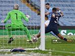 gelandang-aljazair-manchester-city-riyad-mahrez-tengah-mencetak-gol-atas-psg.jpg