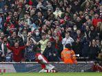 gelandang-arsenal-bukayo-saka-merayakan-gol-pembukanya-lawan-man-city.jpg
