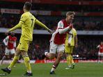 gelandang-arsenal-emile-smith-rowe-tengah-melakukan-selebrasi-setelah-mencetak-gol-pembuka.jpg
