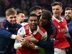 gelandang-arsenal-reiss-nelson-tengah-merayakan-setelah-mencetak-gol-ketiga-timnya.jpg